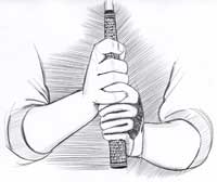Le grip overlaping ou grip vardon.
